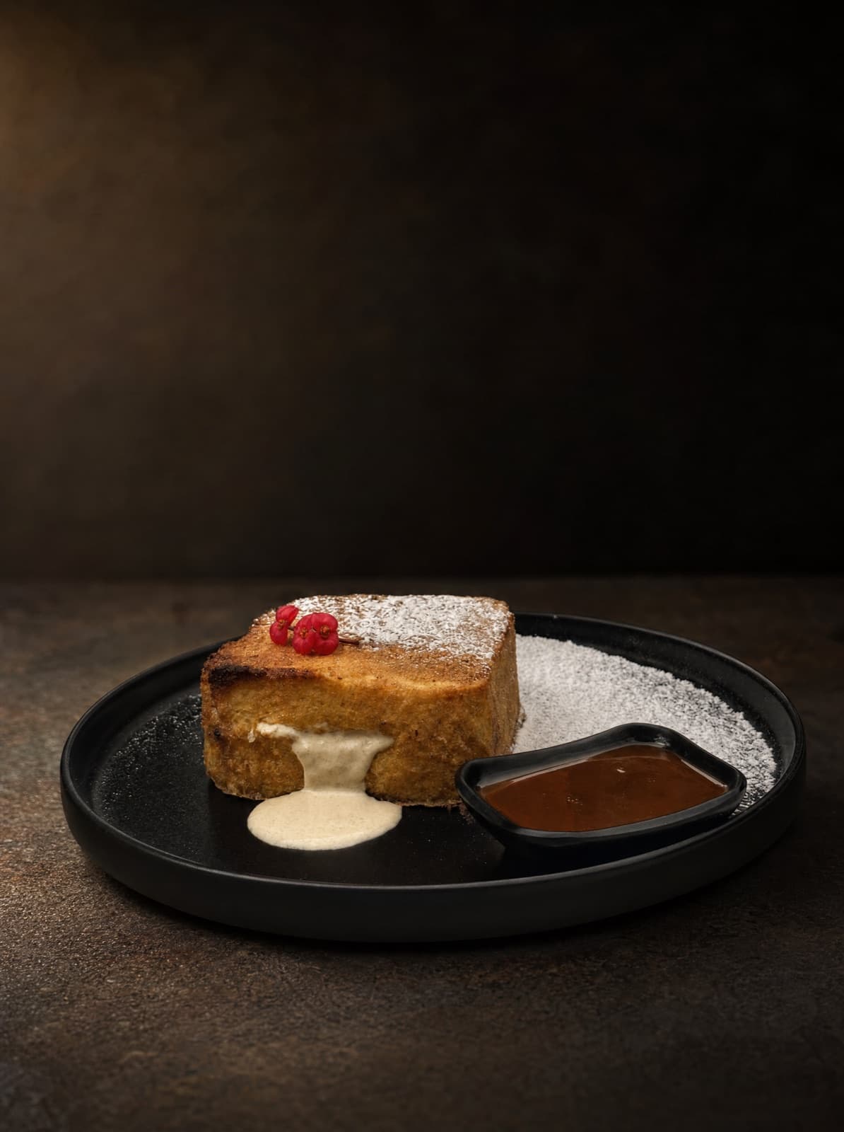 Caramelised toast dessert with cream and chocolate sauce